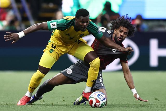 Jamaica's midfielder #04 Ephron Mason-Clark and New Caledonia's midfielder #08 Joris Kenon fight for the ball during the 2026 FIFA World Cup qualifiers semi-final playoff football match between New Caledonia and Jamaica at the Akron Stadium in Zapopan, Mexico on March 26, 2026. (Photo by Ulises Ruiz / AFP)