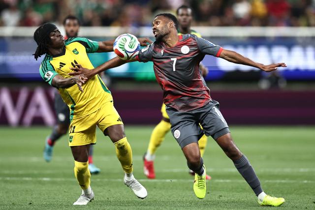Jamaica's forward #11 Tyreece Campbell and New Caledonia's midfielder #07 Jekob Jeno fight for the ball during the 2026 FIFA World Cup qualifiers semi-final playoff football match between New Caledonia and Jamaica at the Akron Stadium in Zapopan, Mexico on March 26, 2026. (Photo by Ulises Ruiz / AFP)