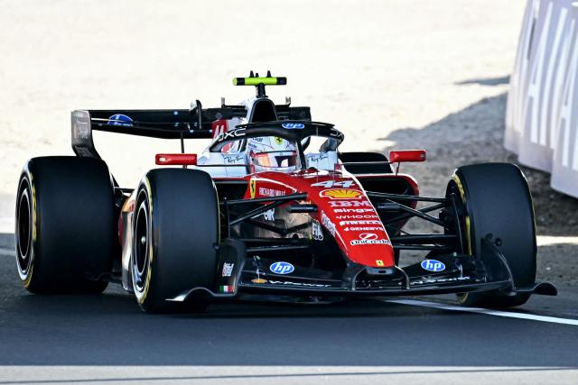 Ferrari's British driver Lewis Hamilton drives during the second practice session ahead of the Formula One Japanese Grand Prix at the Suzuka circuit in Suzuka, Mie prefecture on March 27, 2026. (Photo by Philip FONG / AFP)