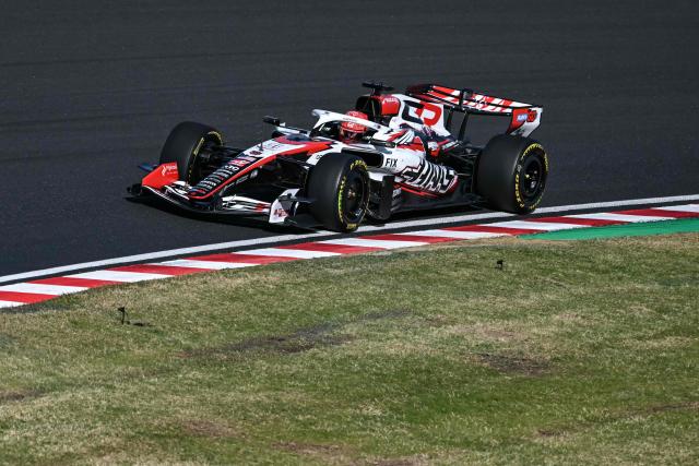 Haas F1 Team's French driver Esteban Ocon drives during the second practice session ahead of the Formula One Japanese Grand Prix at the Suzuka circuit in Suzuka, Mie prefecture on March 27, 2026. (Photo by ANDREW CABALLERO-REYNOLDS / AFP)