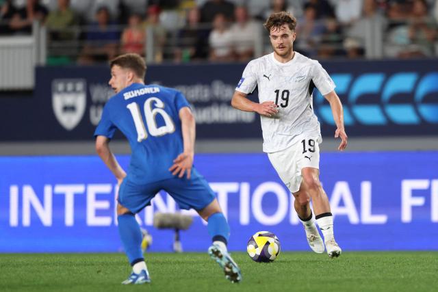 Ben Old of New Zealand looks to make a pass during the international friendly football match between New Zealand and Finland at Eden Park in Auckland on March 27, 2025. (Photo by Michael Bradley / AFP)