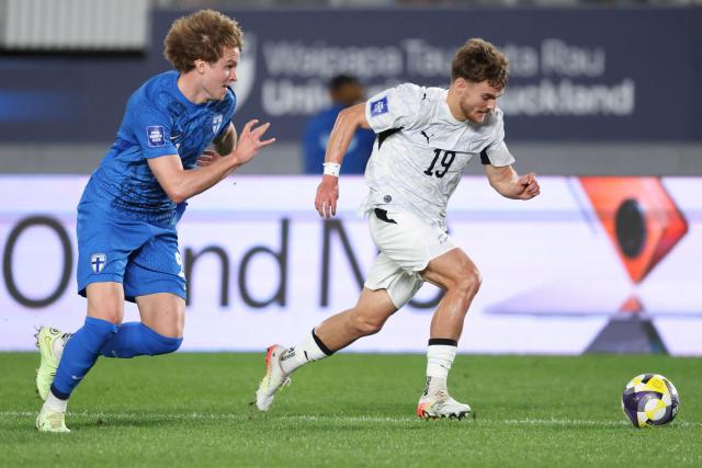 Ben Old of New Zealand runs for the ball during the international friendly football match between New Zealand and Finland at Eden Park in Auckland on March 27, 2025. (Photo by Michael Bradley / AFP)