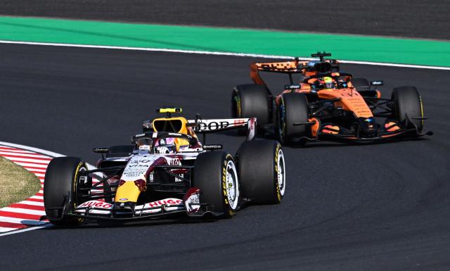 McLaren's Australian driver Oscar Piastri (R) drives behind Racing Bulls' New Zealand driver Liam Lawson (L) during the second practice session ahead of the Formula One Japanese Grand Prix at the Suzuka circuit in Suzuka, Mie prefecture on March 27, 2026. (Photo by ANDREW CABALLERO-REYNOLDS / AFP)