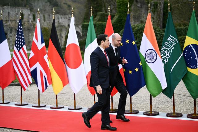 France's Foreign Affairs Minister Jean-Noel Barrot (R) welcomes US Secretary of State Marco Rubio during a G7 Foreign Ministers' meeting at the Vaux-de-Cernay Abbey in Cernay-la-Ville outside Paris, on March 27, 2026. Foreign ministers from the G7 will take part part in a two-day meeting with European nations and allies seeking to narrow differences with the US on the Middle East war while keeping other crises like Ukraine and Gaza high on the agenda. (Photo by Brendan SMIALOWSKI / POOL / AFP)