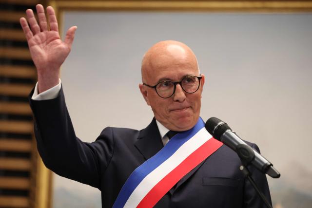 Union des droites pour la République (UDR) leader and newly elected Nice mayor Eric Ciotti waves at the audience at the start of the inaugural city council session in Nice on March 27, 2026. (Photo by Valery HACHE / AFP)