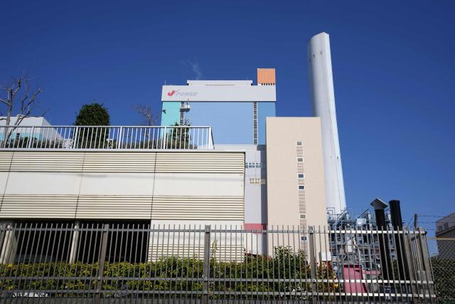 Isogo Thermal Power Station, a coal-fired power plant operated by the Electric Power Development Co., Ltd. or the brand name J-POWER, is seen in Yokohama, Kanagawa Prefecture on March 27, 2026. Japan's government plans to temporarily lift restrictions on coal-fired power plants as it seeks to ease an energy crunch caused by the Middle East war, an official said on March 27, 2026. (Photo by Kazuhiro NOGI / AFP)