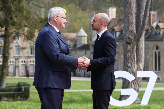 Ukraine’s Foreign Affairs Minister Andrii Sybiha (L) shakes hands with France's Foreign Affairs Minister Jean-Noel Barrot during a G7 Foreign Ministers' meeting with Partner Countries at the Vaux-de-Cernay Abbey in Cernay-la-Ville outside Paris, on March 27, 2026. Foreign ministers from the G7 will take part part in a two-day meeting with European nations and allies seeking to narrow differences with the US on the Middle East war while keeping other crises like Ukraine and Gaza high on the agenda. (Photo by Alain JOCARD / AFP)