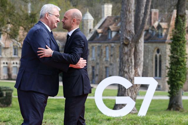 Ukraine’s Foreign Affairs Minister Andrii Sybiha (L) greets France's Foreign Affairs Minister Jean-Noel Barrot during a G7 Foreign Ministers' meeting with Partner Countries at the Vaux-de-Cernay Abbey in Cernay-la-Ville outside Paris, on March 27, 2026. Foreign ministers from the G7 will take part part in a two-day meeting with European nations and allies seeking to narrow differences with the US on the Middle East war while keeping other crises like Ukraine and Gaza high on the agenda. (Photo by Alain JOCARD / AFP)