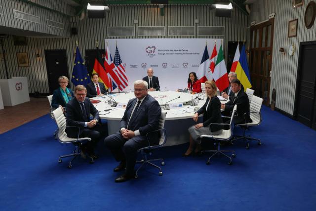 Ukraine's Foreign Minister Andriy Sybiga (C), Germany's Foreign Minister Johann Wadephul, Britain's Foreign Secretary Yvette Cooper, US Secretary of State Marco Rubio, France's Foreign Affairs Minister Jean-Noel Barrot, Canada's Foreign Minister Anita Anand, Italy's Foreign Minister Antonio Tajani, Japans Foreign Minister Toshimitsu Motegi and EU High Representative and Vice-President for Foreign Affairs and Security Policy Kaja Kallas attend talks on Russia's war in Ukraine during a G7 Foreign Ministers' meeting with Partner Countries at the Vaux-de-Cernay Abbey in Cernay-la-Ville outside Paris, on March 27, 2026. Foreign ministers from the G7 will take part part in a two-day meeting with European nations and allies seeking to narrow differences with the US on the Middle East war while keeping other crises like Ukraine and Gaza high on the agenda. (Photo by Alain JOCARD / POOL / AFP)