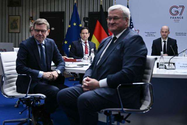 Ukraine's Foreign Minister Andriy Sybiga (R), Germany's Foreign Minister Johann Wadephul, Britain's Foreign Secretary Yvette Cooper, US Secretary of State Marco Rubio and France's Foreign Affairs Minister Jean-Noel Barrot attend talks on Russia's war in Ukraine during a G7 Foreign Ministers' meeting with Partner Countries at the Vaux-de-Cernay Abbey in Cernay-la-Ville outside Paris, on March 27, 2026. Foreign ministers from the G7 will take part part in a two-day meeting with European nations and allies seeking to narrow differences with the US on the Middle East war while keeping other crises like Ukraine and Gaza high on the agenda. (Photo by Brendan SMIALOWSKI / POOL / AFP)