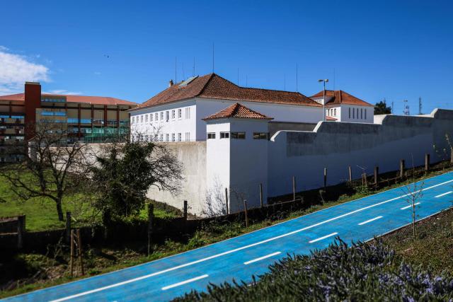 This picture partially shows the Prison in Guarda on March 27, 2026 where Cedric Prizzon, a former French police officer suspected of killing his partner and his ex-girlfriend after kidnapping them and their children, is detained. Prizzon, a one-time member of the Paris police and a former rugby league youth international, is also a fathers' rights activist who had been involved in a bitter public custody battle with his former partner. He had been stripped of his custody rights and had already been already convicted of harassing his former partner, after he illegally took their son to Spain for several weeks in 2021. (Photo by PATRICIA DE MELO MOREIRA / AFP)