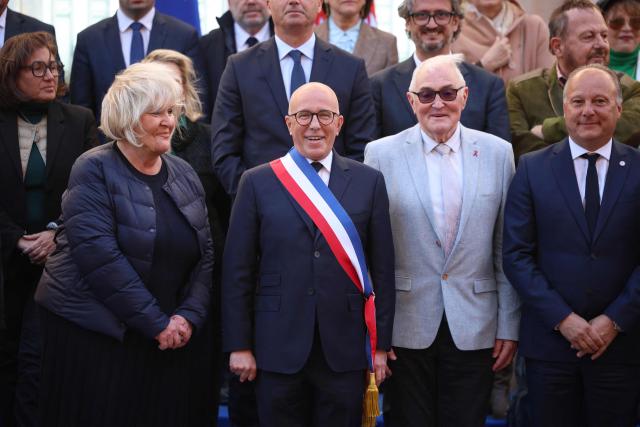 Union des droites pour la République (UDR) leader and newly elected Nice mayor Eric Ciotti (C) with his team for the official picture after the inaugural city council session in Nice on March 27, 2026. (Photo by Valery HACHE / AFP)