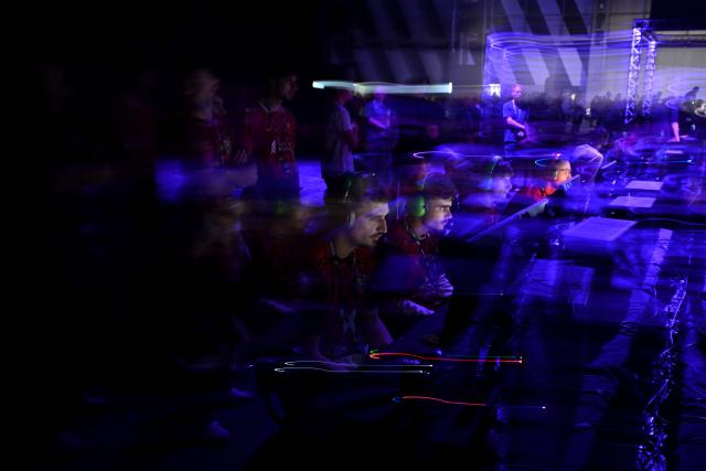 Esports gamers play Call of Duty during DreamHack 2026 at the NEC in Birmingham, central England on March 27, 2026. (Photo by Oli SCARFF / AFP)