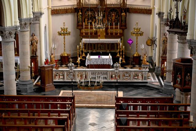 This photograph shows the inside of the Peter and Paul church in Maastricht where a skeleton which could belong to d'Artagnan, the French soldier who inspired the novel The Three Musketeers, was found in an excavation pit opened in the floor, on March 27, 2026. The skeleton was found in Maastricht, in the nave of the modern church whose origins date back to at least the 13th century, during repairs related to a partial floor collapse in February. Charles de Batz de Castelmore, known as d'Artagnan, the famous musketeer of Kings Louis XIII and Louis XIV, spent his life in the service of the French crown and was killed during the siege of Maastricht in 1673. His final resting place has remained a mystery ever since. (Photo by JOHN THYS / AFP)