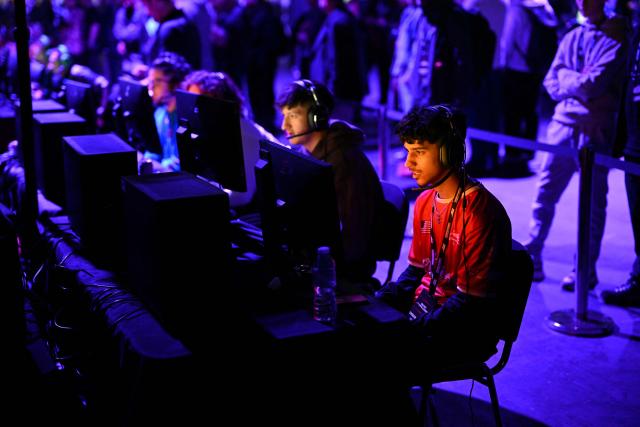 Gamers play Call of Duty during DreamHack 2026 at the NEC in Birmingham, central England on March 27, 2026. (Photo by Oli SCARFF / AFP)