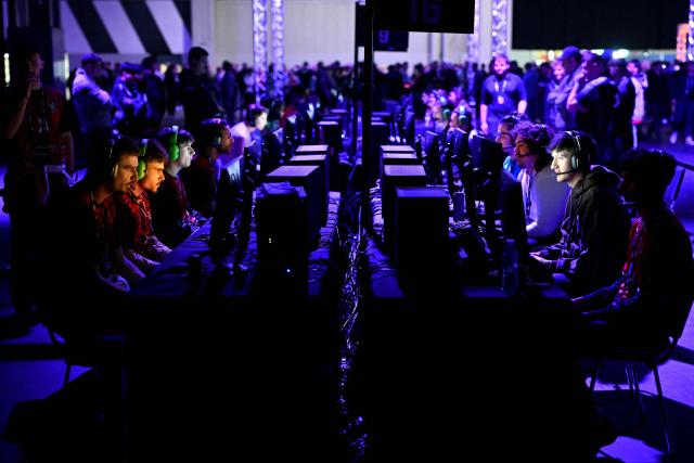 Gamers play Call of Duty during DreamHack 2026 at the NEC in Birmingham, central England on March 27, 2026. (Photo by Oli SCARFF / AFP)