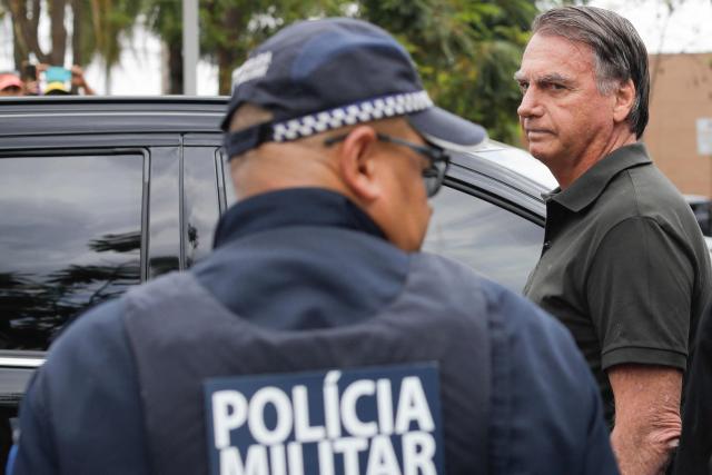 (FILES) Former Brazilian President (2019-2022) Jair Bolsonaro leaves the DF Star hospital in Brasilia on September 14, 2025, after undergoing a series of medical examinations, as he remains under house arrest. Brazil's former President Jair Bolsonaro left the hospital  to begin serving his “humanitarian” house arrest, his doctor said, on March 26, 2026. (Photo by Sergio Lima / AFP)