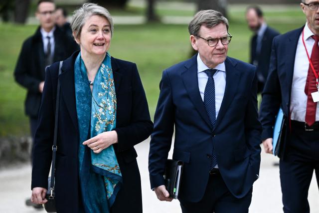 Britain's Foreign Secretary Yvette Cooper and Germany's Foreign Minister Johann Wadephul walk during a G7 Foreign Ministers' meeting with Partner Countries at the Vaux-de-Cernay Abbey in Cernay-la-Ville outside Paris, on March 27, 2026. Foreign ministers from the G7 will take part part in a two-day meeting with European nations and allies seeking to narrow differences with the US on the Middle East war while keeping other crises like Ukraine and Gaza high on the agenda. (Photo by Brendan SMIALOWSKI / POOL / AFP)
