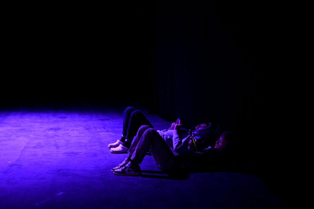 Attendees rest during DreamHack 2026 at the NEC in Birmingham, central England on March 27, 2026. (Photo by Oli SCARFF / AFP)
