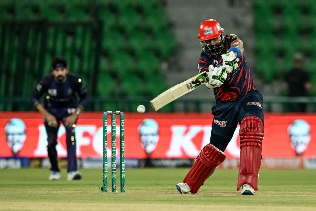 Karachi King's UAE cricket player Muhammad Waseem plays a shot during the Pakistan Super League (PSL) Twenty20 match between Karachi Kings and Quetta Gladiators at Gaddafi Stadium in Lahore on March 27, 2026. (Photo by Arif ALI / AFP)