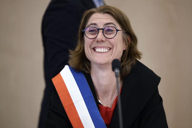 Grenoble's new Mayor Laurence Ruffin of the left-wing and ecologist alliance reacts during the inaugural meeting of the new municipal council at the city hall of Grenoble, central-eastern France, on March 27, 2026. (Photo by Maxime Gruss / AFP)