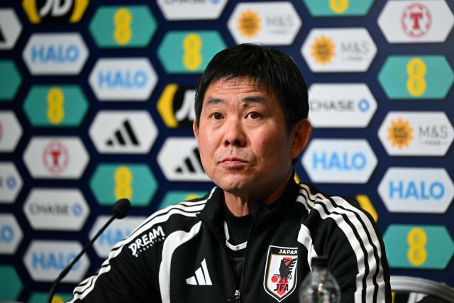Japan's Head Coach Hajime Moriyasu attends a press conference at Hampden Park, in Glasgow, on March 27, 2026, on the eve of their international friendly football match against Scotland. (Photo by ANDY BUCHANAN / AFP)