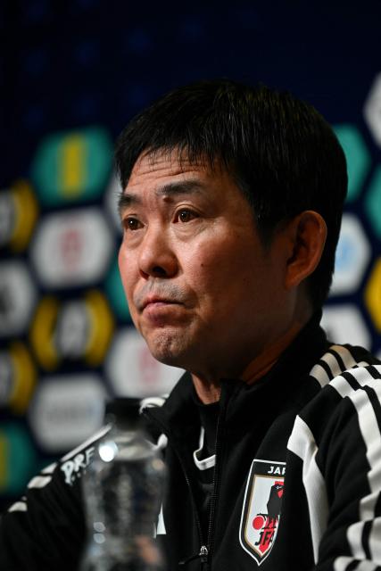 Japan's Head Coach Hajime Moriyasu attends a press conference at Hampden Park, in Glasgow, on March 27, 2026, on the eve of their international friendly football match against Scotland. (Photo by ANDY BUCHANAN / AFP)