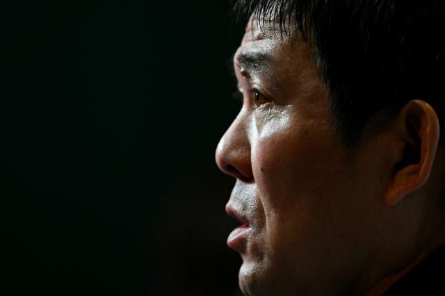 Japan's Head Coach Hajime Moriyasu attends a press conference at Hampden Park, in Glasgow, on March 27, 2026, on the eve of their international friendly football match against Scotland. (Photo by ANDY BUCHANAN / AFP)
