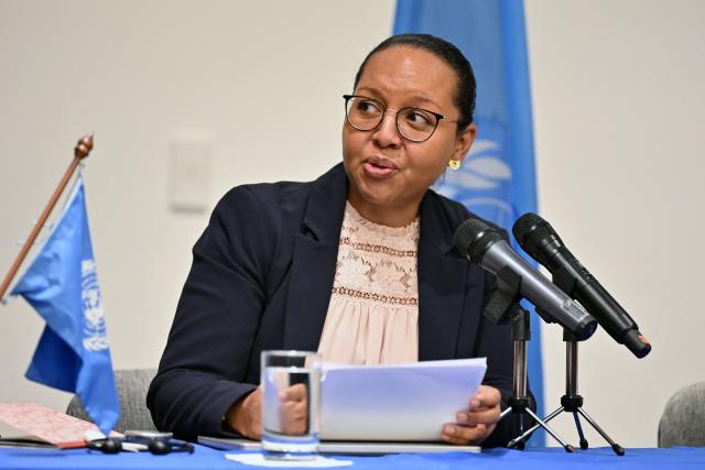 Michelle Small, president of the United Nations working group against the use of mercenaries, speaks during a press conference to present a report, in Bogota on March 27, 2026. (Photo by Daniel MUNOZ / AFP)