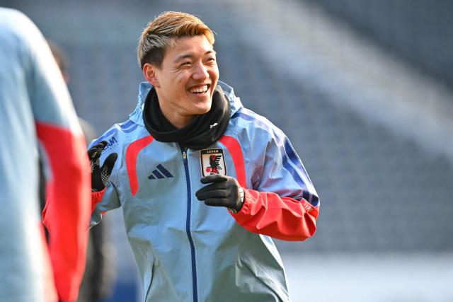 Japan's Wataru Endo takes part in a team training session at Hampden Park, in Glasgow, on March 27, 2026, on the eve of their international friendly football match against Scotland. (Photo by ANDY BUCHANAN / AFP)