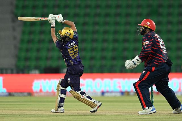 Quetta Gladiators' Shamyl Hussain plays a shot during the Pakistan Super League (PSL) Twenty20 cricket match between Quetta Gladiators and Karachi Kings at the Qaddafi Cricket Stadium in Lahore on March 27, 2026. (Photo by Arif ALI / AFP)