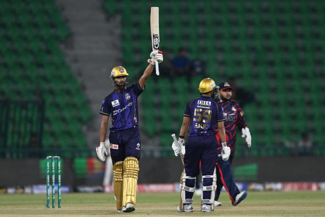 Quetta Gladiators' Shamyl Hussain celebrates after scoring a half-century (50 runs) during the Pakistan Super League (PSL) cricket match between Quetta Gladiators and Karachi Kings at the Gaddafi Stadium in Lahore on March 27, 2026. (Photo by Arif ALI / AFP)