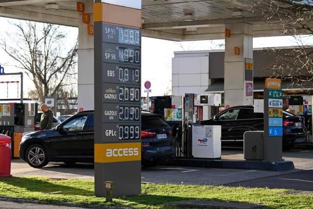 The daily prices for E10, SP98, Super Ethanol and diesel are displayed at a Total Access station in Forbach, northeastern France, on March 27, 2026. Many Germans living near the border come to France to fill up their tanks as prices are higher in Germany. (Photo by Jean-Christophe VERHAEGEN / AFP)