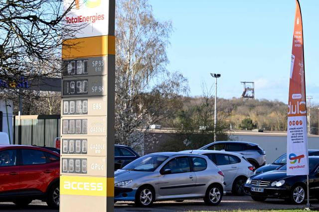 The daily prices for E10, SP98, Super Ethanol and diesel are displayed at a Total Access station in Forbach, northeastern France, on March 27, 2026. Many Germans living near the border come to France to fill up their tanks as prices are higher in Germany. (Photo by Jean-Christophe VERHAEGEN / AFP)