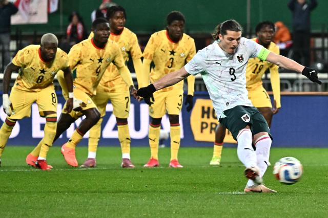 Austria's forward #09 Marcel Sabitzer (2nd R) kicks the ball to score on penalty the 1-0 opening goal during the friendly match Austra vs Ghana in Vienna, Austria, on March 27, 2026. (Photo by Joe Klamar / AFP)
