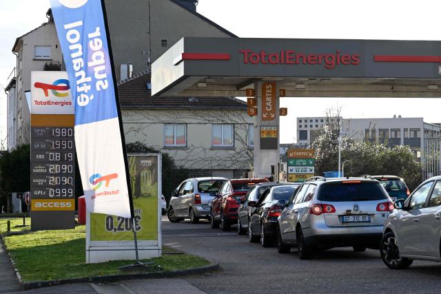 The daily prices for E10, SP98, Super Ethanol and diesel are displayed at a Total Access station in Forbach, northeastern France, on March 27, 2026. Many Germans living near the border come to France to fill up their tanks as prices are higher in Germany. (Photo by Jean-Christophe VERHAEGEN / AFP)