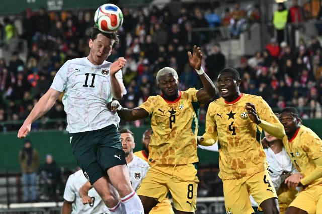 Austria's forward #11 Michael Gregoritsch (L), Ghana's midfielder #08 Kwasi Sibo (C) and Ghana's midfielder #04 Jonas Adjetey (2nd R) vie for the ball during the friendly match Austra vs Ghana in Vienna, Austria, on March 27, 2026. (Photo by Joe Klamar / AFP)