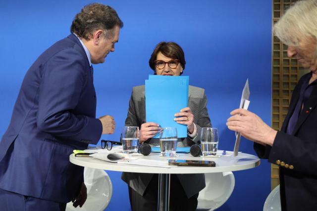 France's Agriculture Minister Annie Genevard (C) reacts next to France's Transports Minister Philippe Tabarot (L) and France’s junior Minister in charge of the sea and fisheries Catherine Chabaud (R) during a presentation of a support plan for the activity of the economic sectors most affected by the energy crisis at the Bercy finance ministry in Paris on March 27, 2026. (Photo by Ludovic MARIN / AFP)