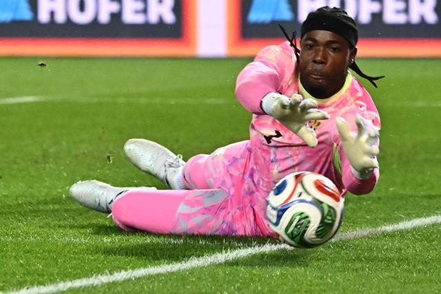 Ghana's goalkeeper #01 Lawrence Ati-Zigi saves the ball during the friendly match Austria vs Ghana in Vienna, Austria, on March 27, 2026. (Photo by Joe Klamar / AFP)