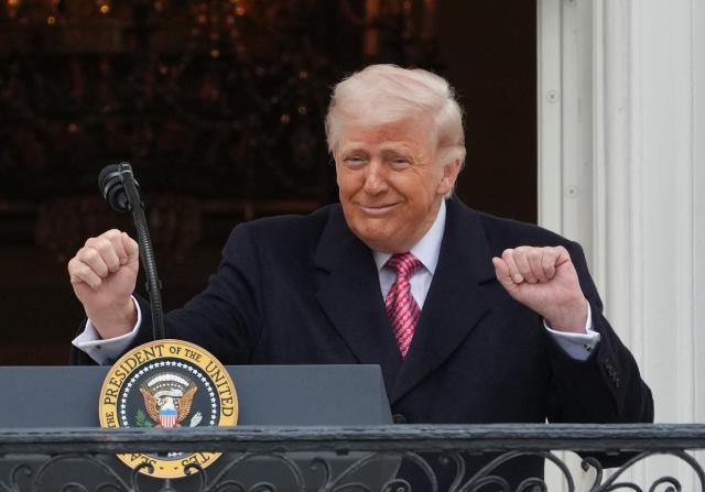 US President Donald Trump delivers remarks to farmers from the Truman balcony of the White House in Washington, DC, on March 27, 2026. (Photo by Ken Cedeno / AFP)