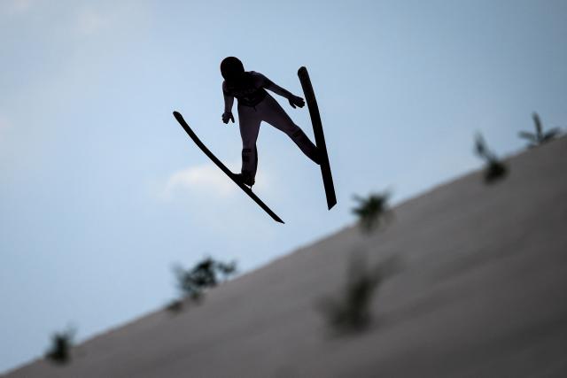 Austria's Julia Muehlbacher competes during the trial round of the Women Individual Flying Hill competition of the FIS Ski Jumping World Cup in Planica, Slovenia on March 27, 2026. (Photo by Jure Makovec / AFP)