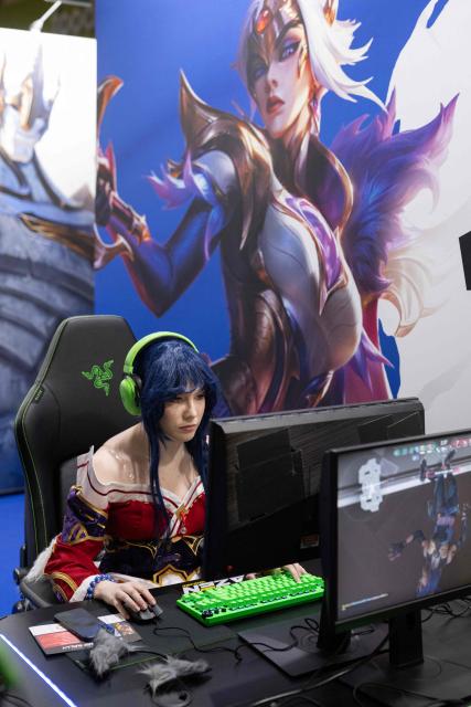 A gamer plays League of Legends during the DreamHack 2026 gaming convention at the NEC in Birmingham, central England on March 27, 2026. (Photo by Oli SCARFF / AFP)