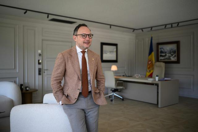 Head of the Andorran government Xavier Espot Zamora poses for a photo at his office in Andorra on March 26, 2026. Enclosed between France and Spain, the principality—whose co-princes are French President Emmanuel Macron and the Catholic bishop of the Spanish border town of Urgell, Bishop Josep-Lluis Serrano Pentinat, are the co-princes, is, along with the Vatican, the only state in Europe to completely ban abortion, even in cases of rape, incest, danger to the mother, or fetal illness.  The head of the government of the Principality of Andorra, where abortion remains prohibited under all circumstances, told AFP that he is hopeful of “decriminalizing” abortion within a year, but without legalizing it, ruling out any changes to Andorran institutions. (Photo by Ed JONES / AFP)
