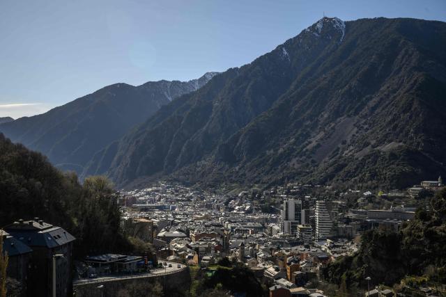 This photograph shows a general view shows Andorra on March 26, 2026. Enclosed between France and Spain, the principality—whose co-princes are French President Emmanuel Macron and the Catholic bishop of the Spanish border town of Urgell, Bishop Josep-Lluis Serrano Pentinat, are the co-princes, is, along with the Vatican, the only state in Europe to completely ban abortion, even in cases of rape, incest, danger to the mother, or fetal illness.  The head of the government of the Principality of Andorra, where abortion remains prohibited under all circumstances, told AFP that he is hopeful of “decriminalizing” abortion within a year, but without legalizing it, ruling out any changes to Andorran institutions. (Photo by Ed JONES / AFP)