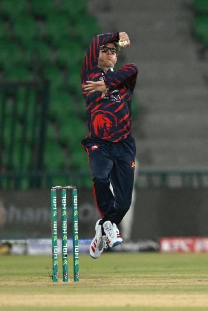 Karachi Kings' Adam Zampa delivers the ball during the Pakistan Super League (PSL) cricket match between Karachi Kings and Quetta Gladiators at the Qaddafi Cricket Stadium in Lahore on March 27, 2026. (Photo by Arif ALI / AFP)