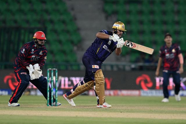 Quetta Gladiators' Rilee Rossouw plays a shot during the Pakistan Super League (PSL) Twenty20 cricket match between Quetta Gladiators and Karachi Kings at the Qaddafi Cricket Stadium in Lahore on March 27, 2026. (Photo by Arif ALI / AFP)
