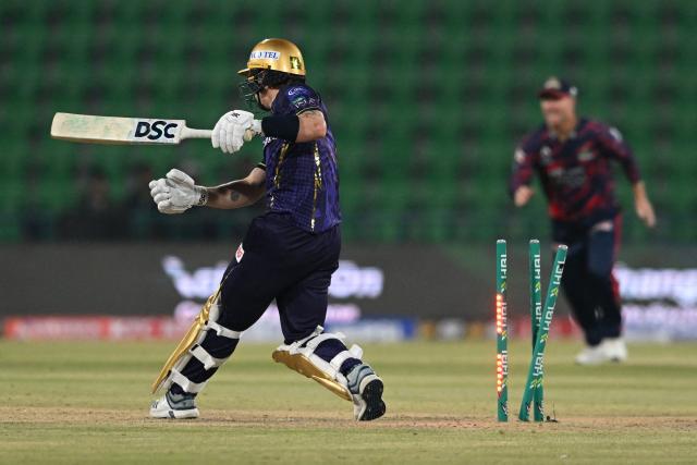 Quetta Gladiators' Tom Curran is clean bowled by Karachi kings' Hassan Ali during the Pakistan Super League (PSL) Twenty20 match between Quetta Gladiators and Karachi Kings at Gaddafi Stadium in Lahore on March 27, 2026. (Photo by Arif ALI / AFP)