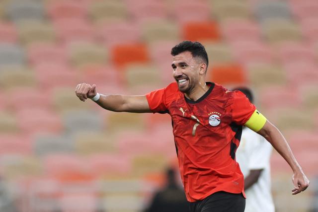 Egypt's forward #7 Mahmoud Trezeguet celebrates after scoring his team's second goal during the friendly football match between Saudi Arabia and Egypt at King Abdullah Sports City in Jeddah on March 27, 2026. (Photo by AFP)