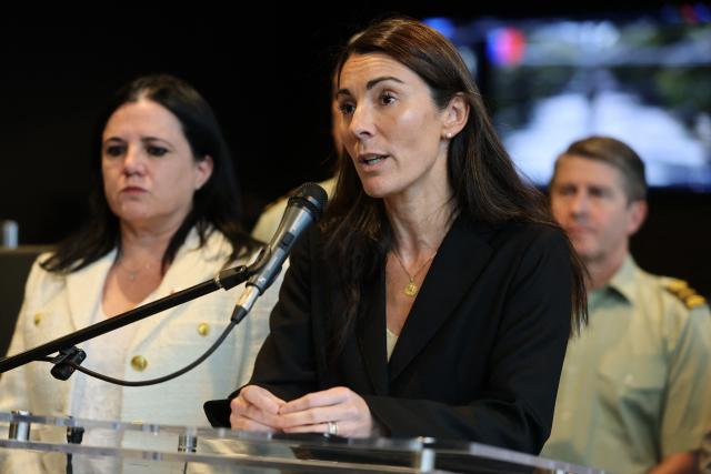 Chile's Minister of Education Maria Paz Arzola speaks at a press conference after an armed student attacked classmates and teachers at a school in Calama, in northern Chile, in Santiago on March 27, 2026. A student killed a school employee with a knife and wounded four others — three of them minors — in northern Chile on Friday, in an attack inside a private school, the government said. (Photo by Javier TORRES / AFP)