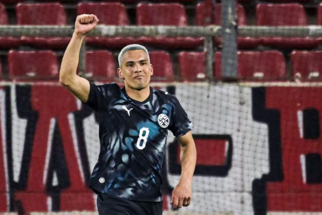 Paraguay's midfielder #08 Diego Gomez celebrates scoring his team's first goal during a friendly football match between Greece and Paraguay at the Georgios Karaiskaki Stadium in Athens on March 27, 2026.  (Photo by Aris MESSINIS / AFP)
